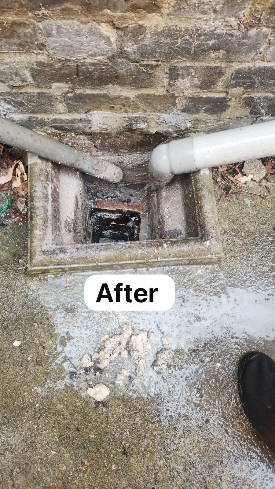 Outside drain flowing freely — after